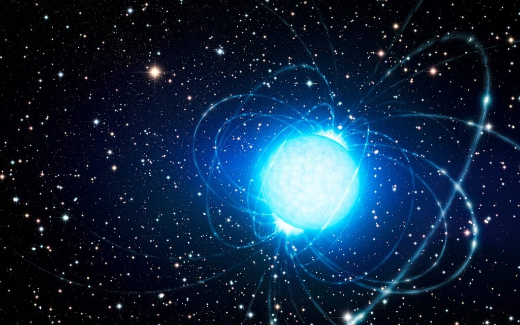 This artist’s impression shows the magnetar CXOU J164710.2-455216 in the very rich and young star cluster Westerlund 1. This remarkable cluster contains hundreds of very massive stars, some shining with a brilliance of almost one million suns. European astronomers have for the first time demonstrated that this magnetar — an unusual type of neutron star with an extremely strong magnetic field — probably was formed as part of a binary star system. The discovery of the magnetar’s former companion elsewhere in the cluster helps solve the mystery of how a star that started off so massive could become a magnetar, rather than collapse into a black hole.